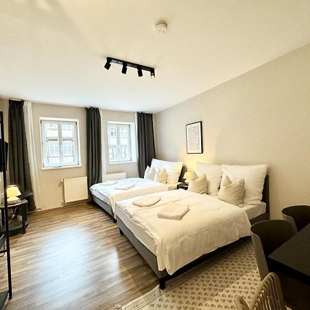Gina Stay - Apartmenthaus Im Zentrum Von クヴェードリンブルク エクステリア 写真