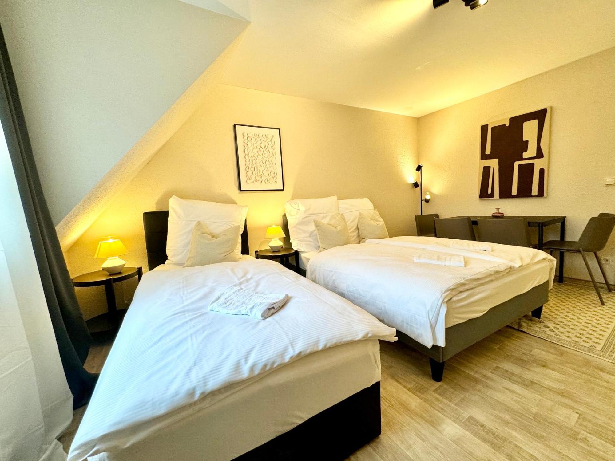 Gina Stay - Apartmenthaus Im Zentrum Von クヴェードリンブルク エクステリア 写真