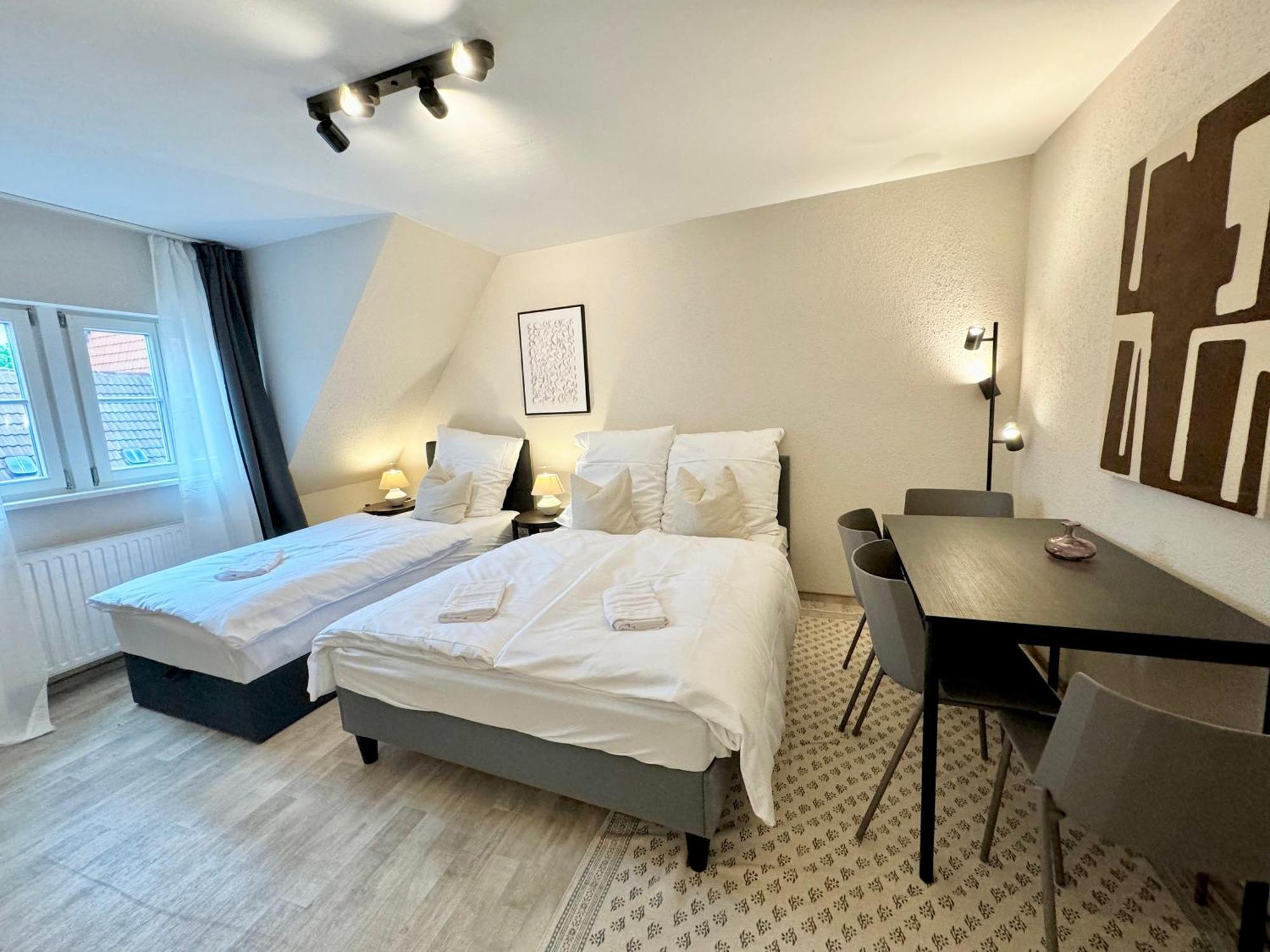 Gina Stay - Apartmenthaus Im Zentrum Von クヴェードリンブルク エクステリア 写真